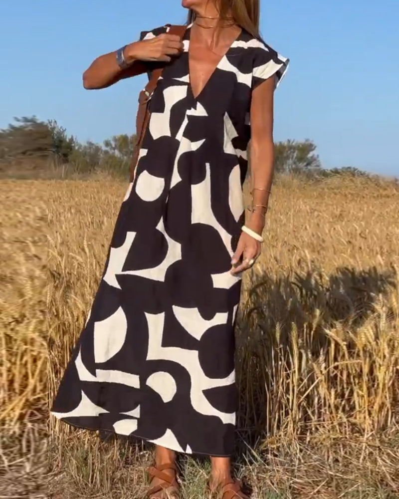 Dorevia | Dames jurk met print en V-hals – korte mouwen, losse pasvorm, zomer casual feest