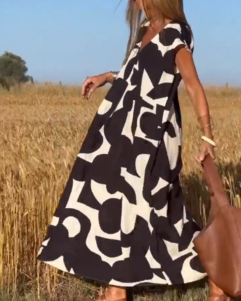 Dorevia | Dames jurk met print en V-hals – korte mouwen, losse pasvorm, zomer casual feest