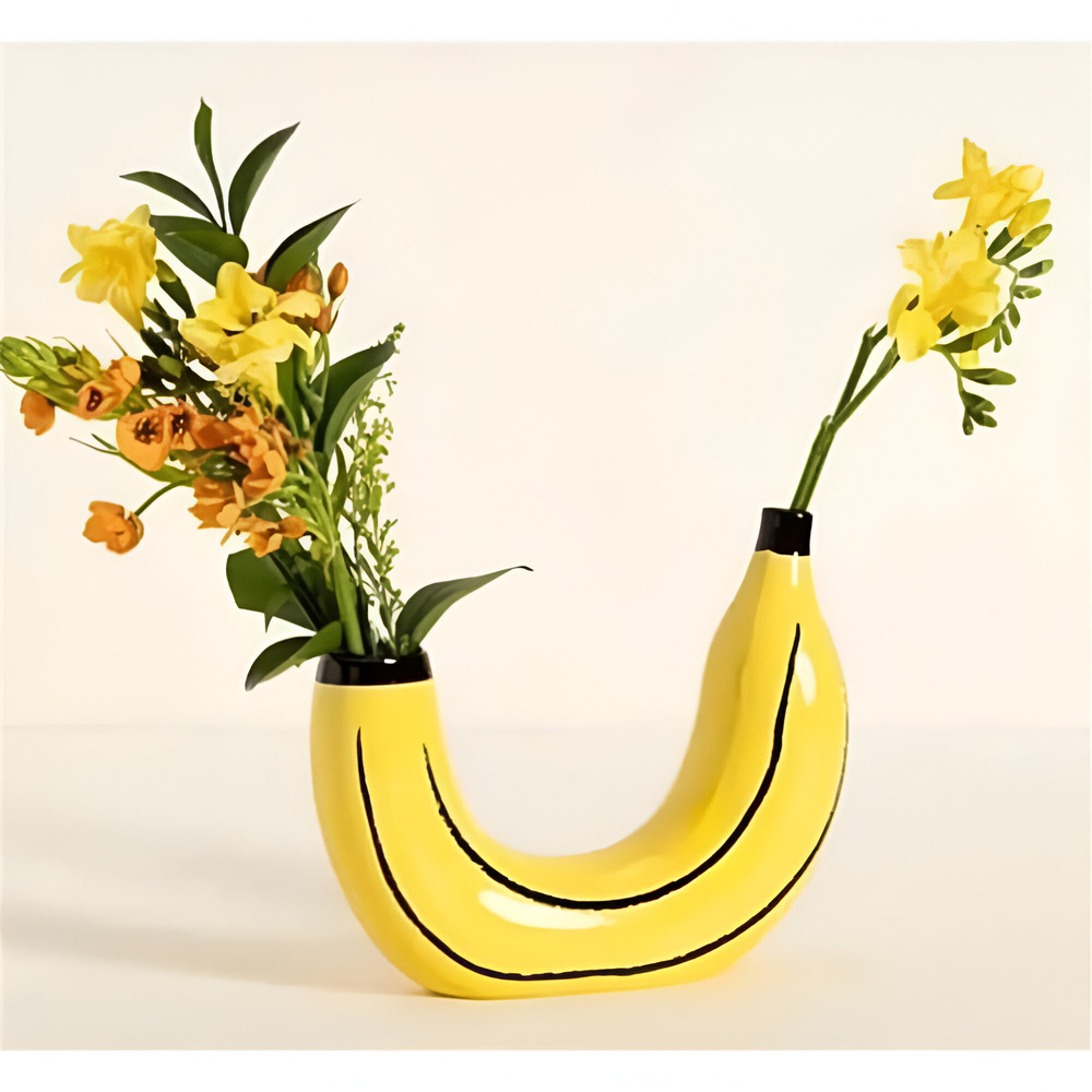 Crescenta | Banaanvormige decoratieve vaas – gemaakt van hars, stijlvolle woondecoratie