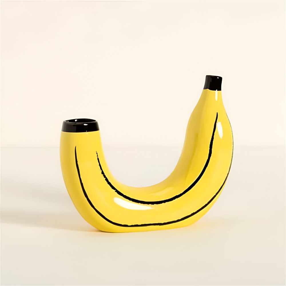 Crescenta | Banaanvormige decoratieve vaas – gemaakt van hars, stijlvolle woondecoratie