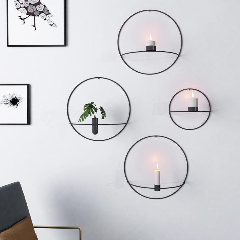 FrameLume | Creatieve metalen wandkaarsenhouder en vaas – moderne woondecoratie