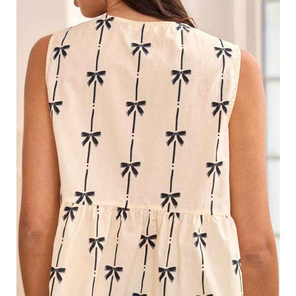 Vionne | bow printed, tie closure, sleeveless top, chic and casual