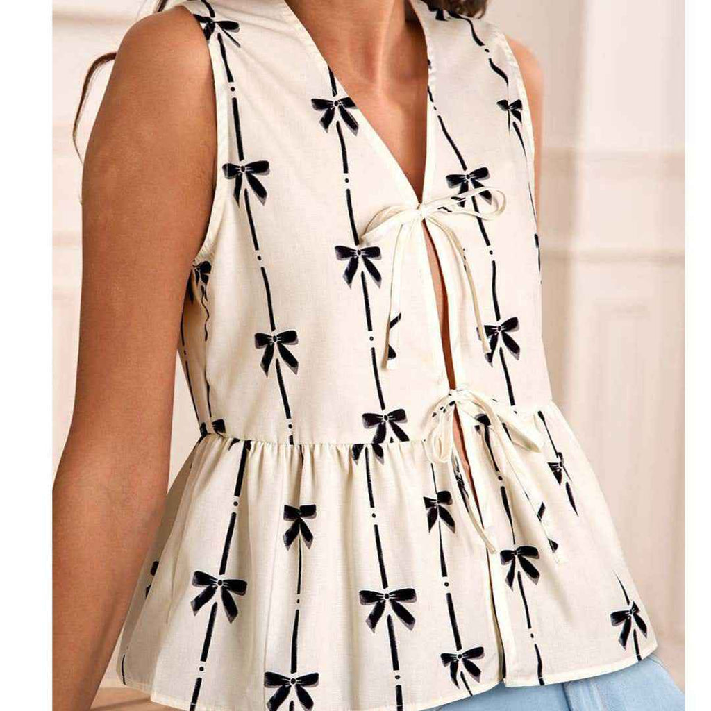 Vionne | bow printed, tie closure, sleeveless top, chic and casual