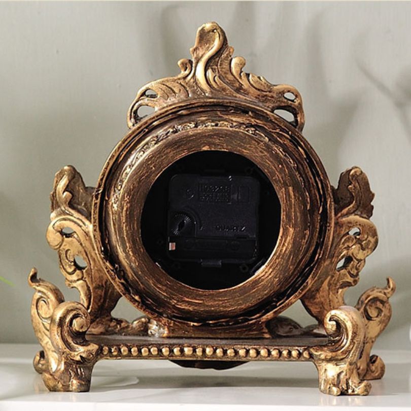 HeritageTick | Antieke decoratieve tafelklok van hars