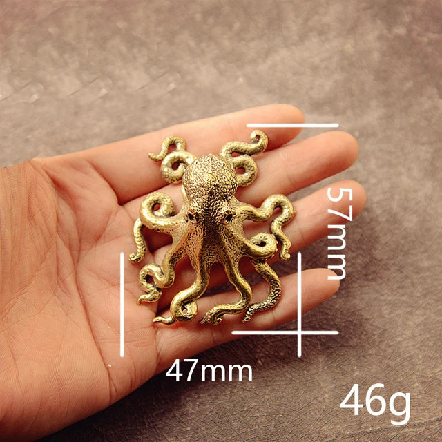 Octovale | Mini gouden octopus beeldje – decoratief tafel- en plankornament