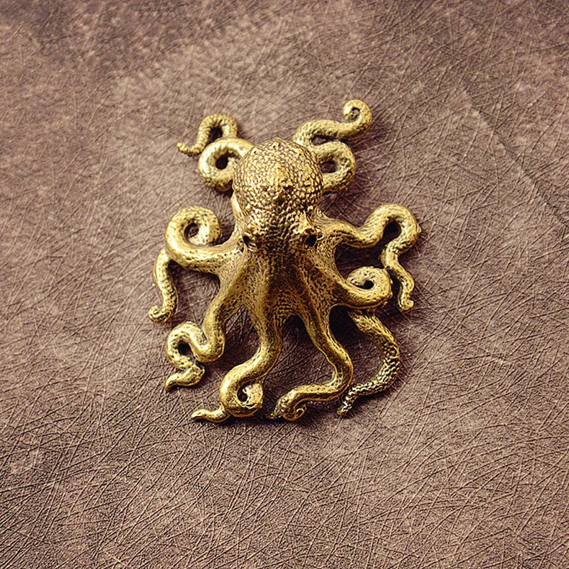Octovale | Mini gouden octopus beeldje – decoratief tafel- en plankornament