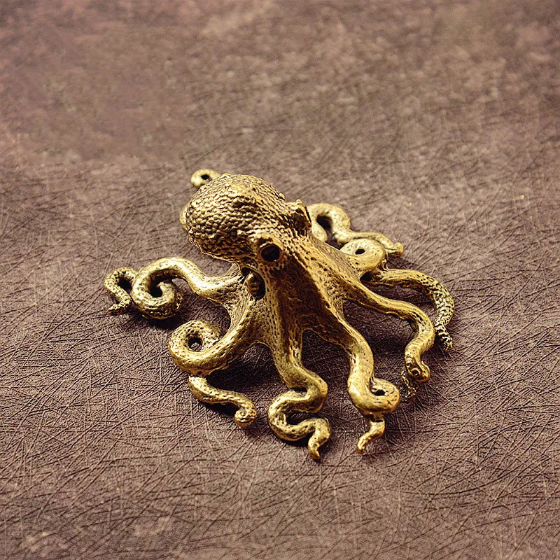 Octovale | Mini gouden octopus beeldje – decoratief tafel- en plankornament