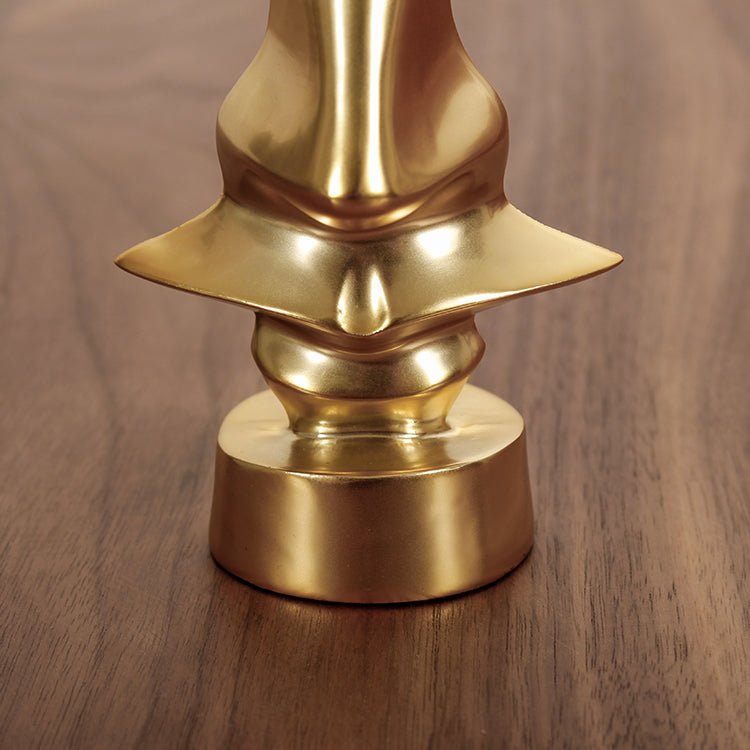 Optigold | Gouden metalen neus- en bril sculptuur – Moderne decoratieve kunst voor thuis en op kantoor