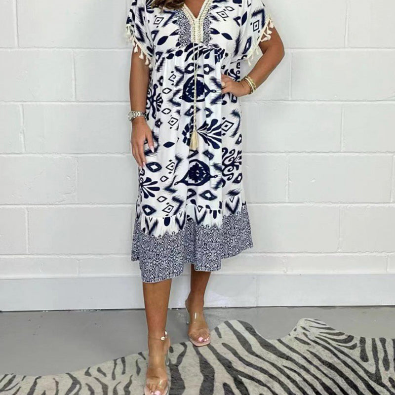 Lyla | Casual jurk met print voor dames – Zomerse midi-jurk met V-hals en franjes aan de mouwen